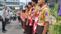 Pelaksanaan Karya Bakti Lebaran 2025 oleh Gerakan Pramuka Kwartir Ranting Tangerang di Posko Polsek Tangerang, di Jalan Ki Samauan, Kota Tangerang