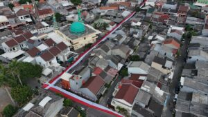 Merah Putih Membentang 400 Meter di Cipondoh, Simbol Semangat Menuju Indonesia Emas